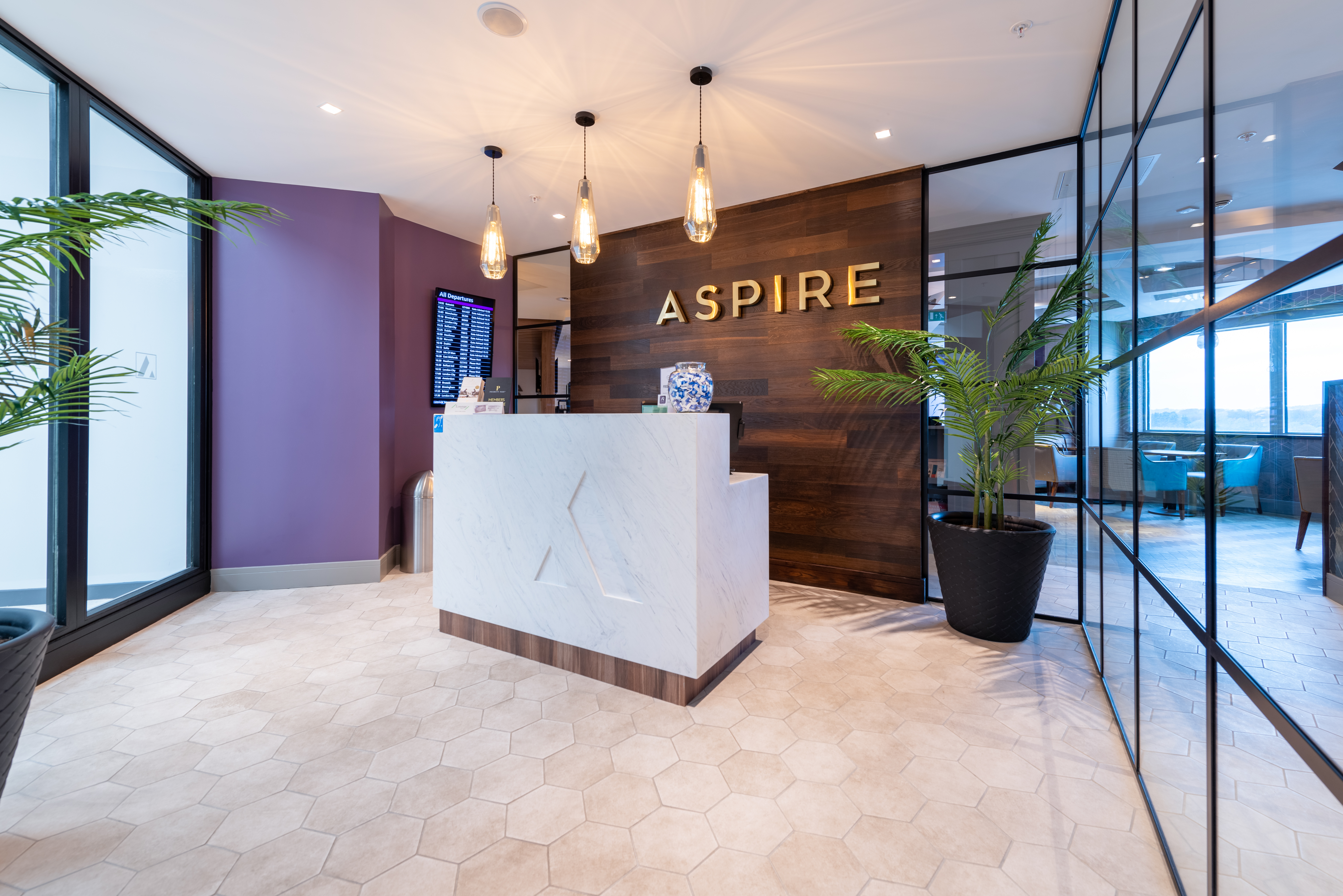 Guests check-in at the Edinburgh Gate 16 Aspire Lounge reception