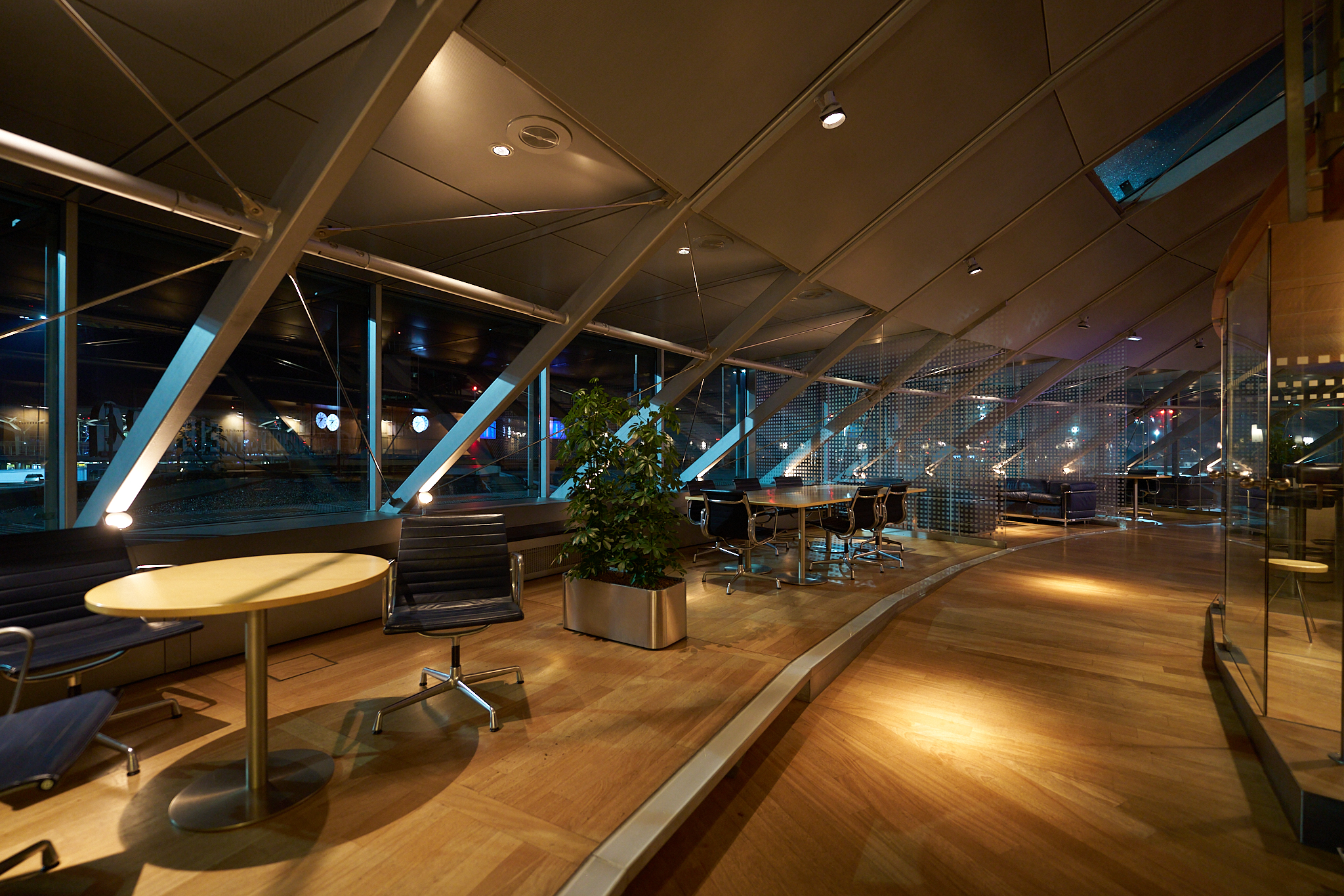Two seater table with an outside view at the Basel Airport Lounge