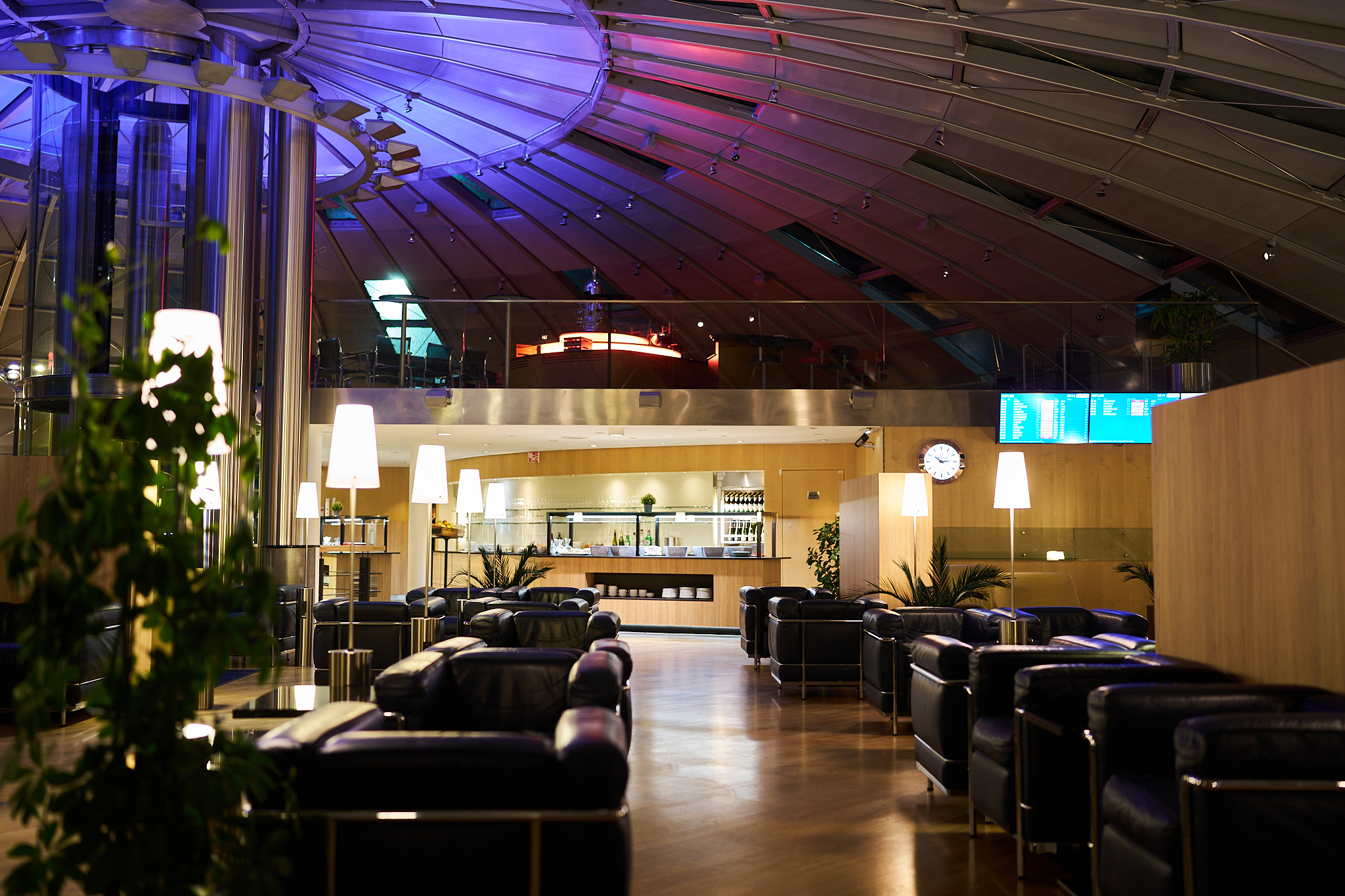 Colourful ceiling lights in the Basel lounge at night