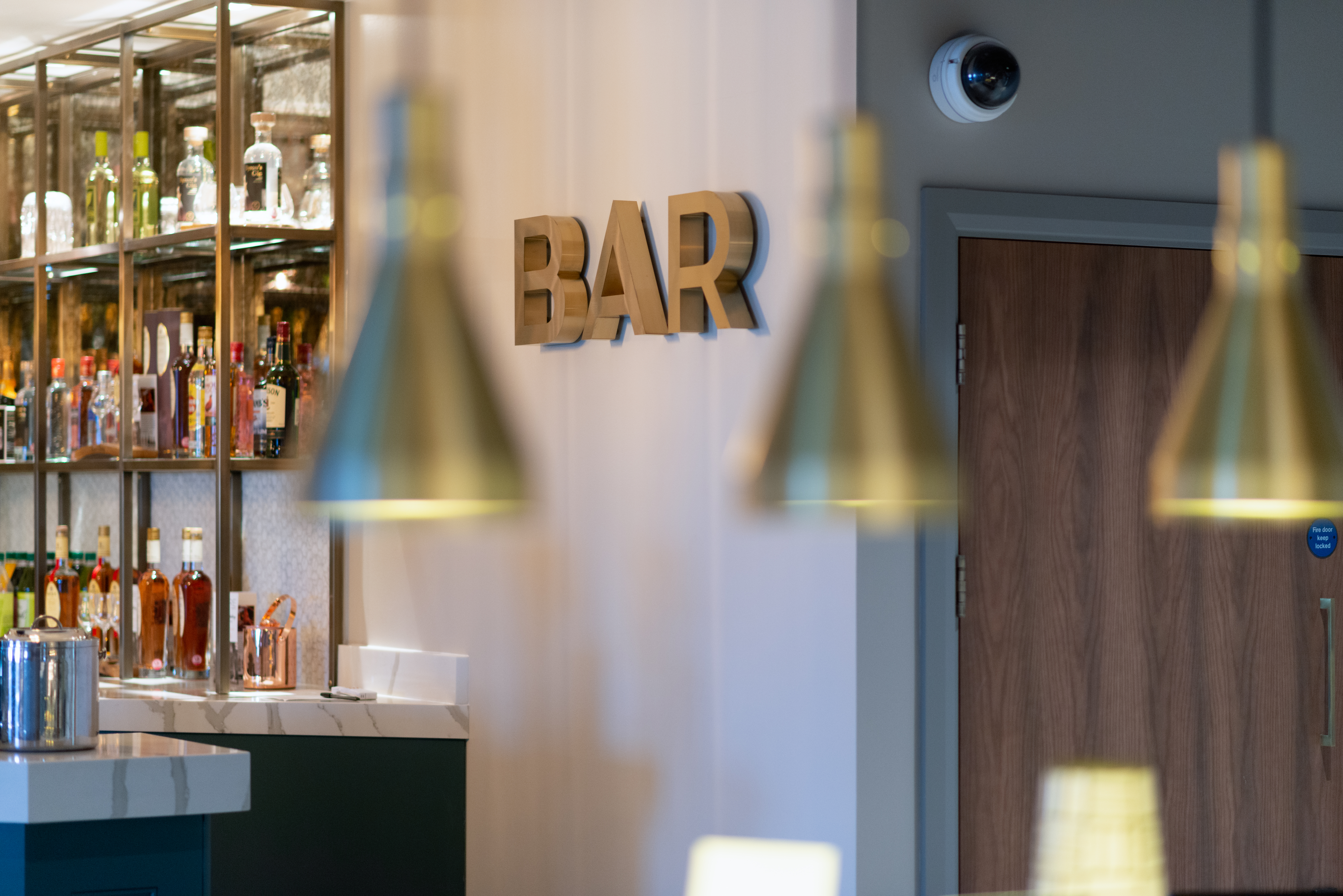 Enjoy complimentary drinks from the bar area at Edinburgh Gate 16 Aspire Lounge